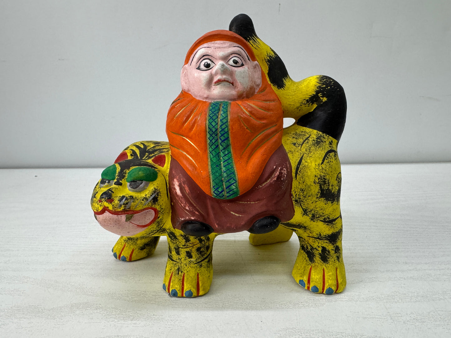 Y9917 NINGYO ceramic Fushimi doll Daruma riding a tiger Japan vintage figurine