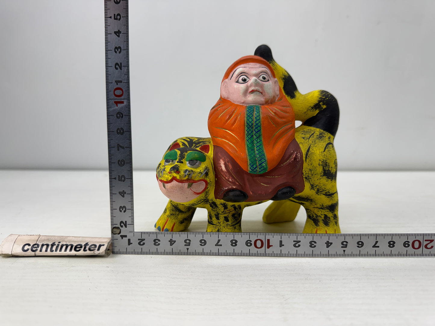 Y9917 NINGYO ceramic Fushimi doll Daruma riding a tiger Japan vintage figurine