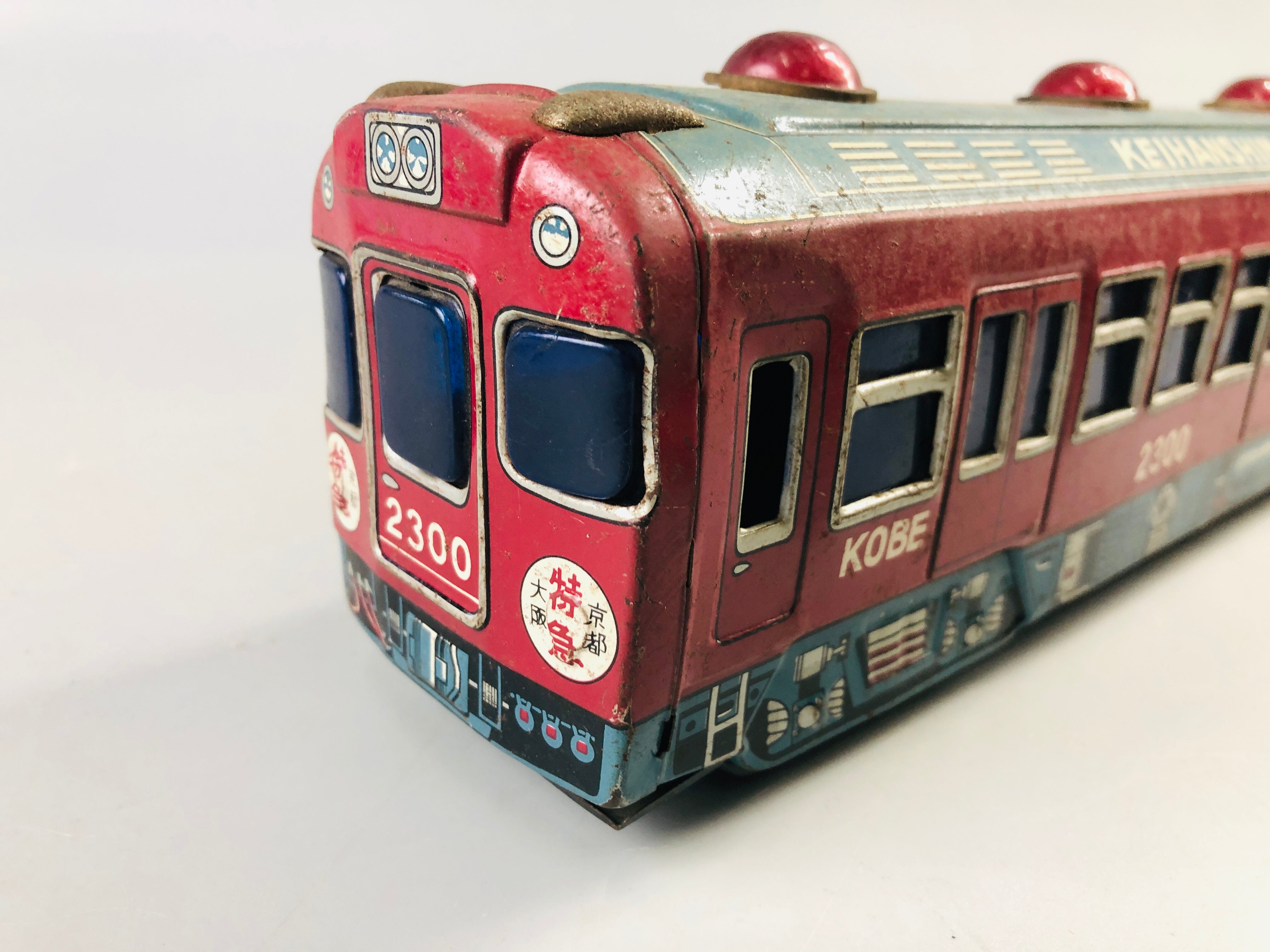 Y7032 [VIDEO] TIN TOY train Keihanshin 2300 transportation