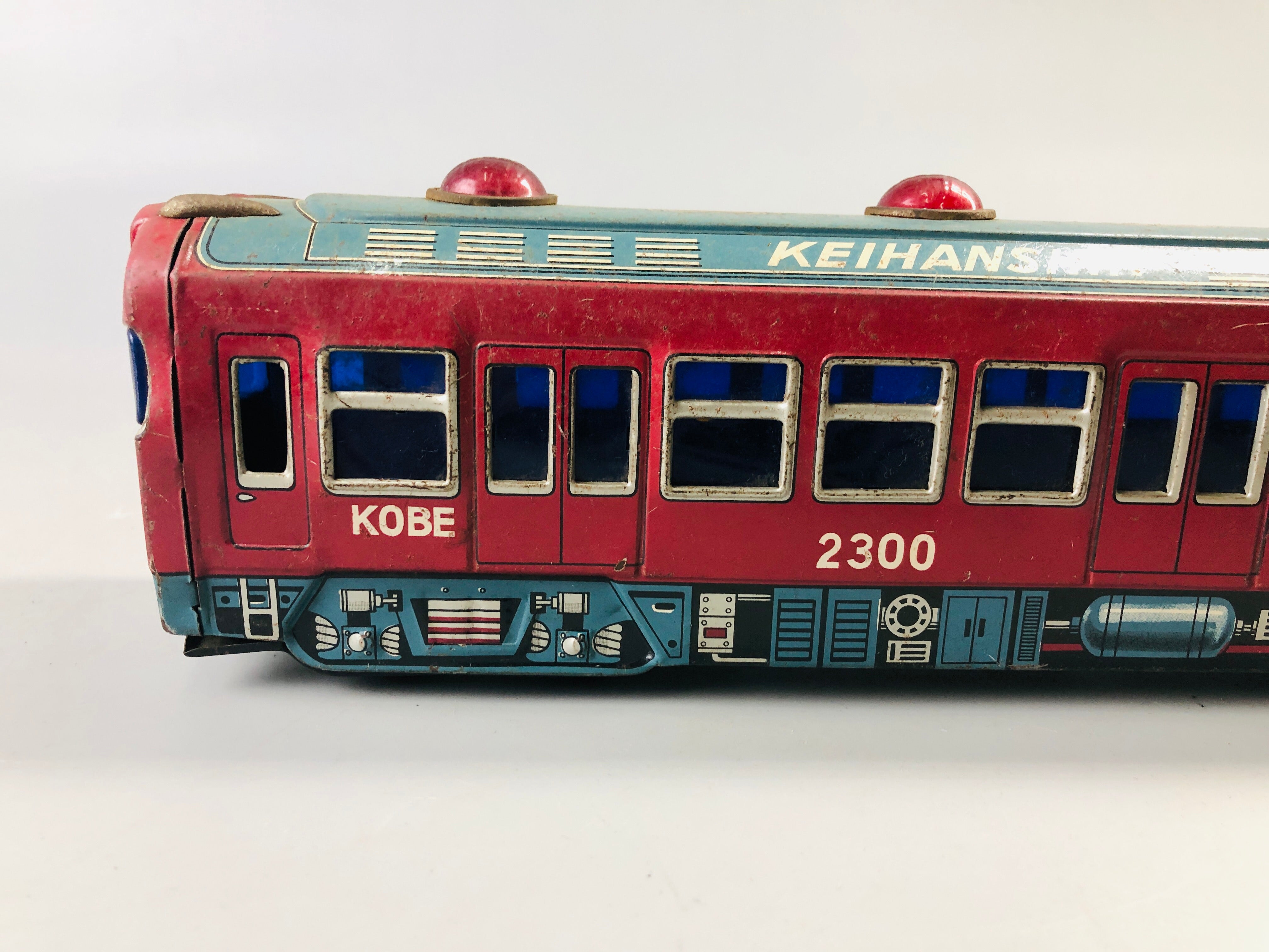Y7032 [VIDEO] TIN TOY train Keihanshin 2300 transportation