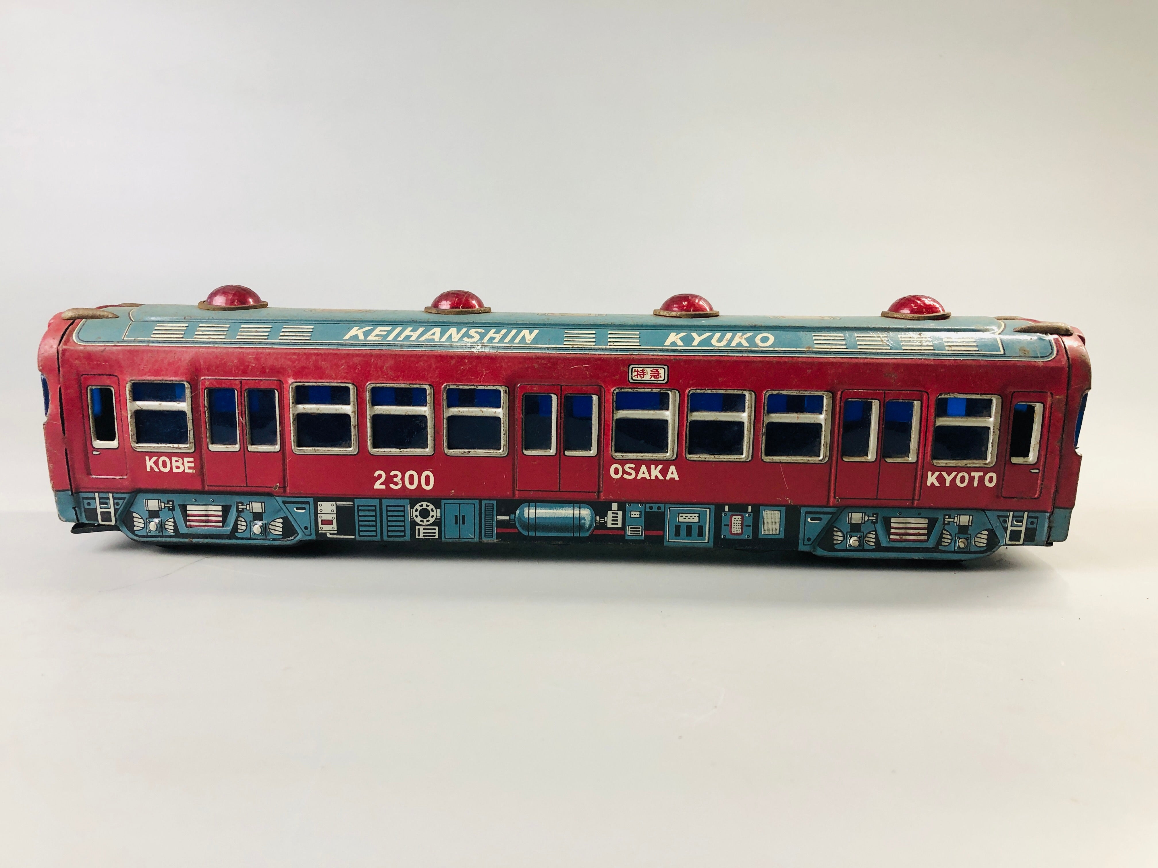 Y7032 [VIDEO] TIN TOY train Keihanshin 2300 transportation